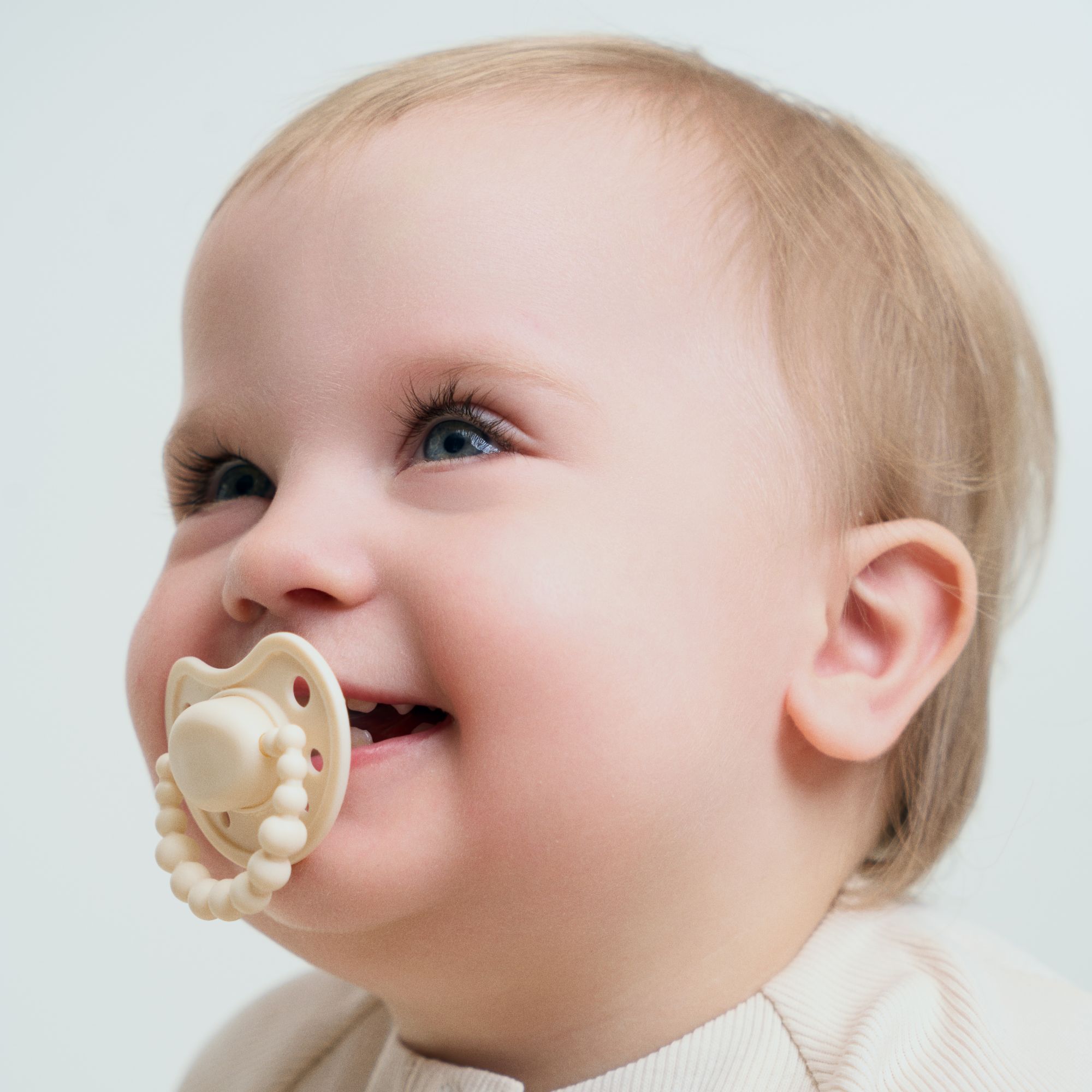 LUU Kids Smoczek pozycjonujący American Cream 6m+, 1 sztuka